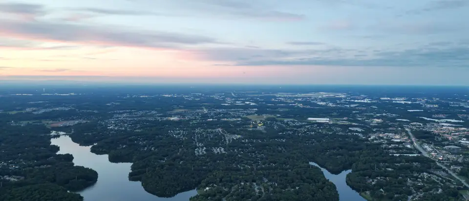 Lakes and woodland around High Point, next door to Archdale, NC, seen from the air at dawn