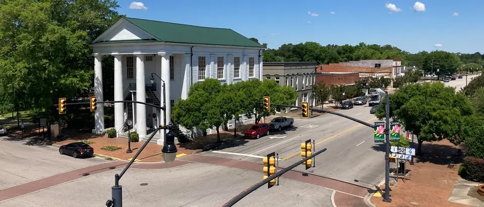 Looking down on downtown Cheraw, SC, with the white-columned town hall and tree-lined streets