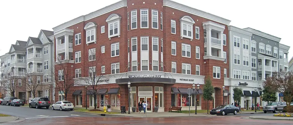 Red-brick shops and apartments around the town center at Birkdale Village in Huntersville, NC