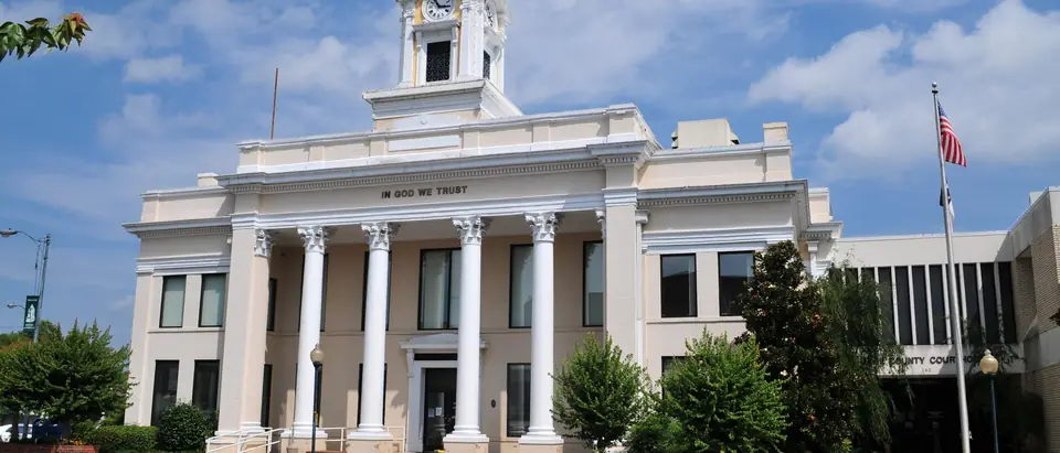 The white-columned Davie County Courthouse with its clock tower in downtown Mocksville, NC